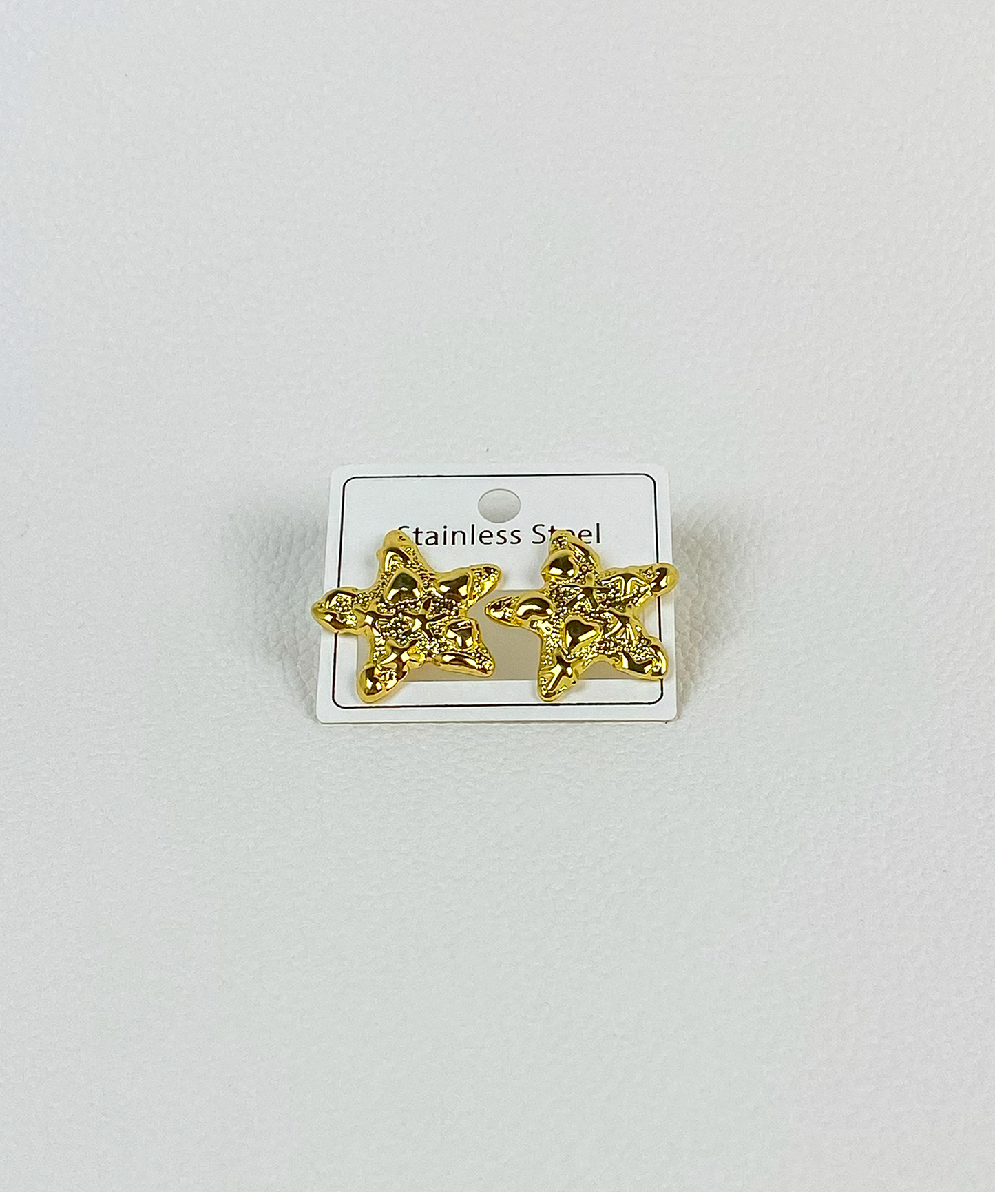 Gold star earrings