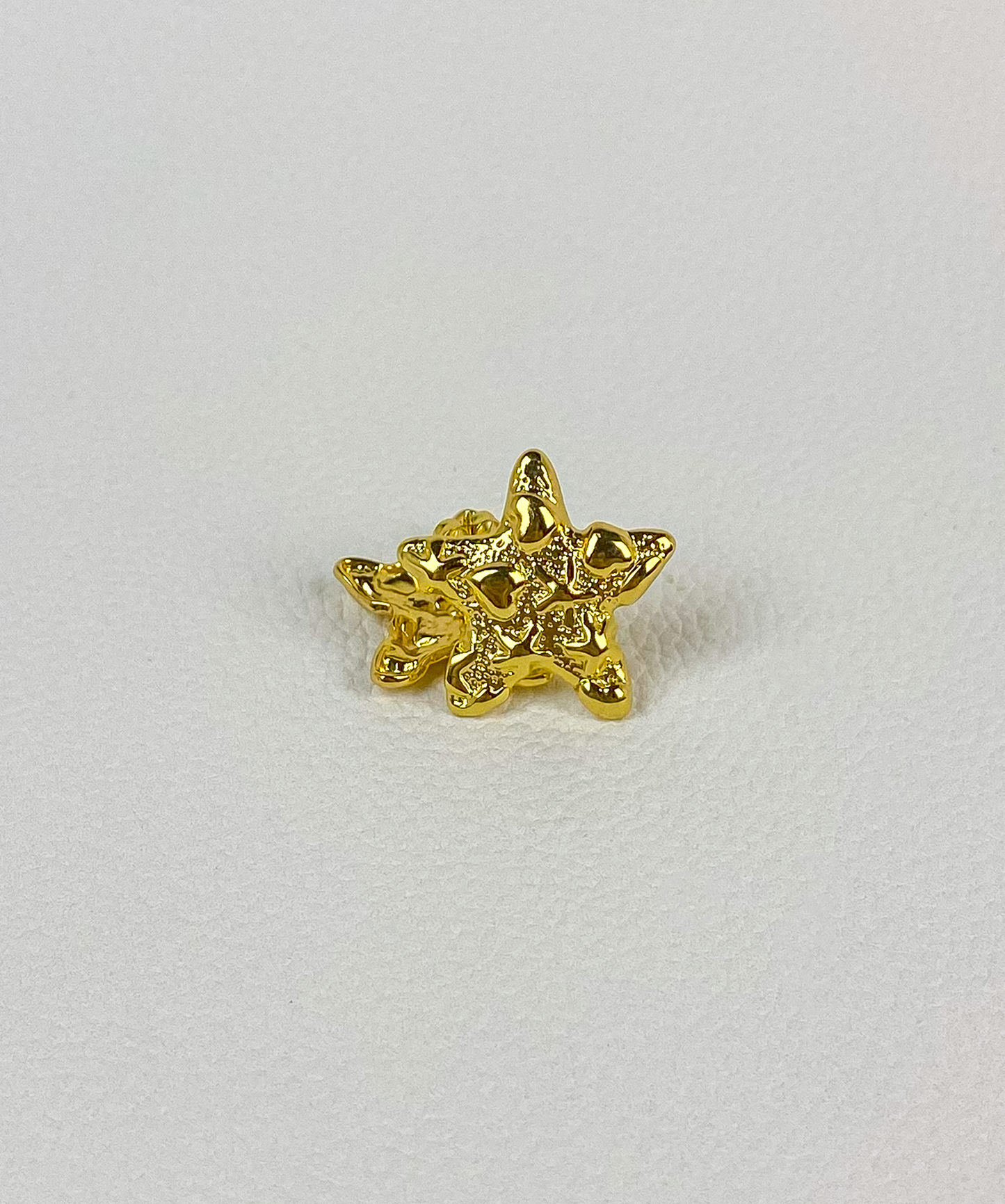 Gold star earrings