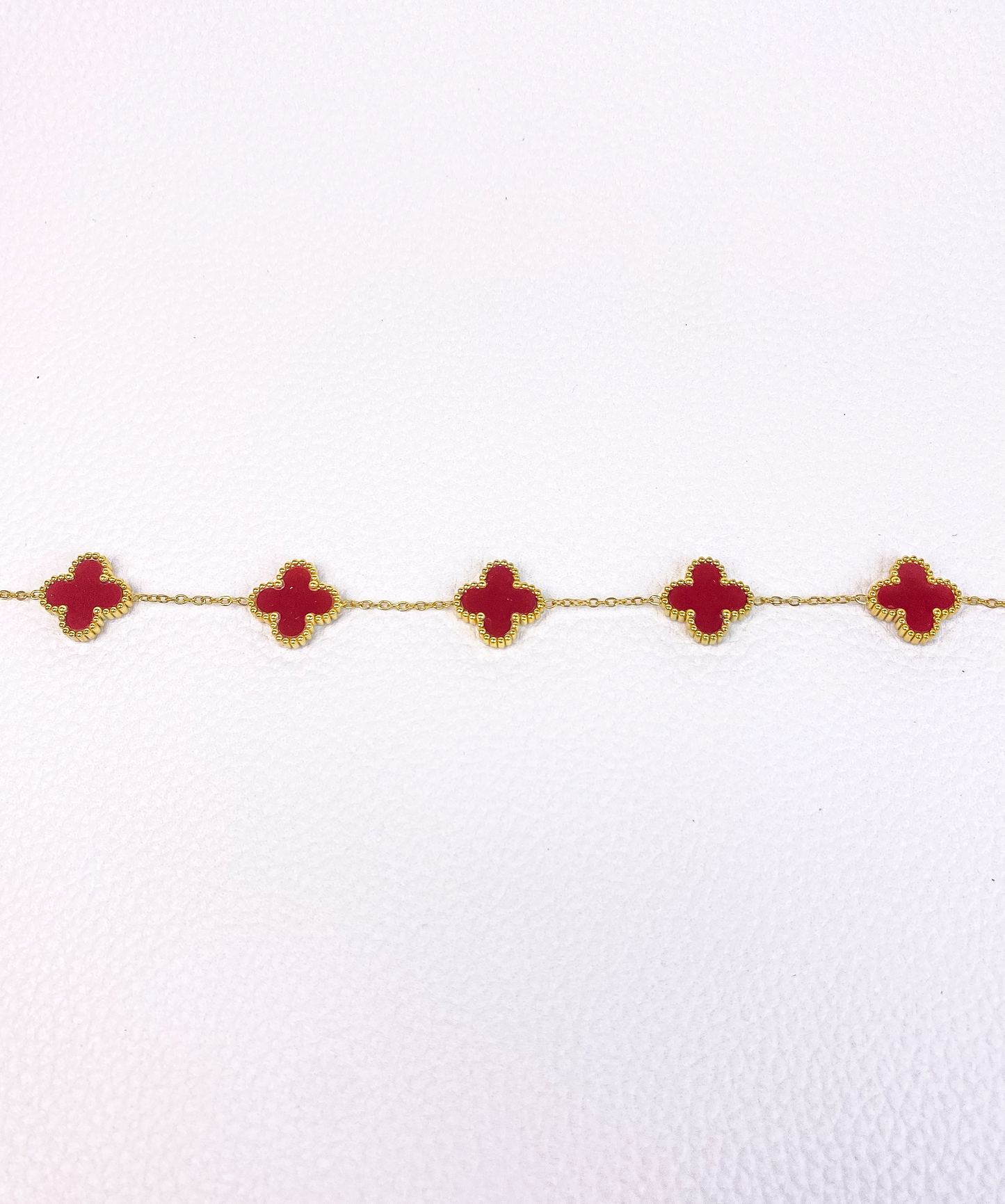 Burgundy van cleef gold bracelet