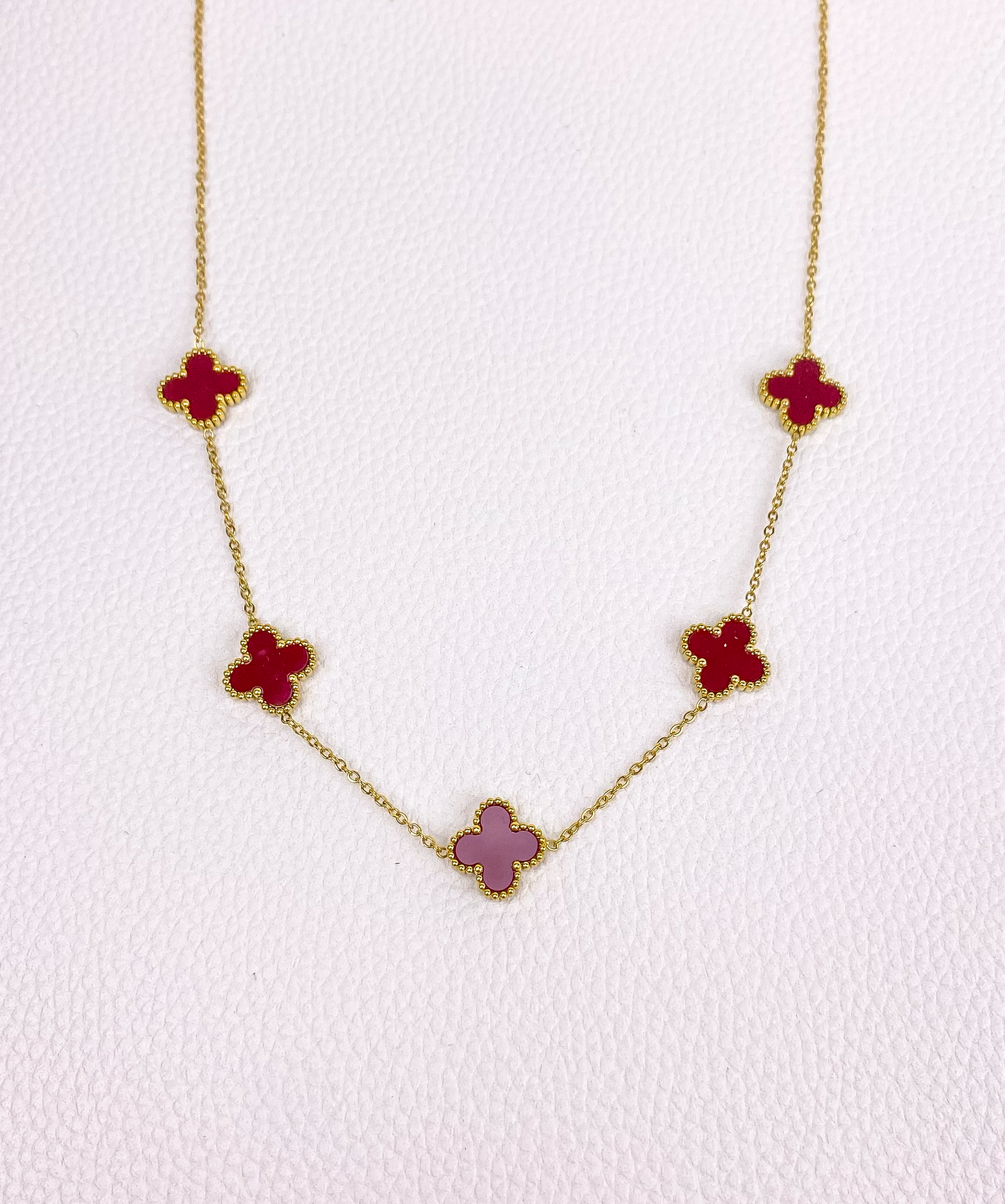 Burgundy van cleef gold necklace
