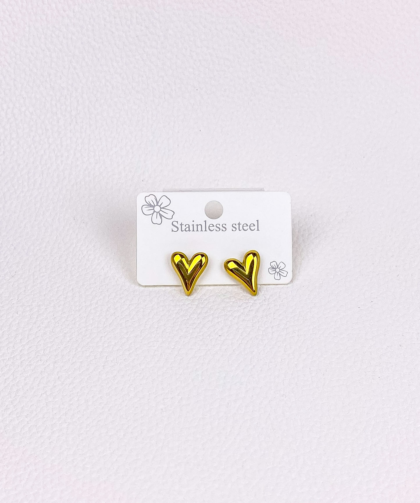 Gold heart earring