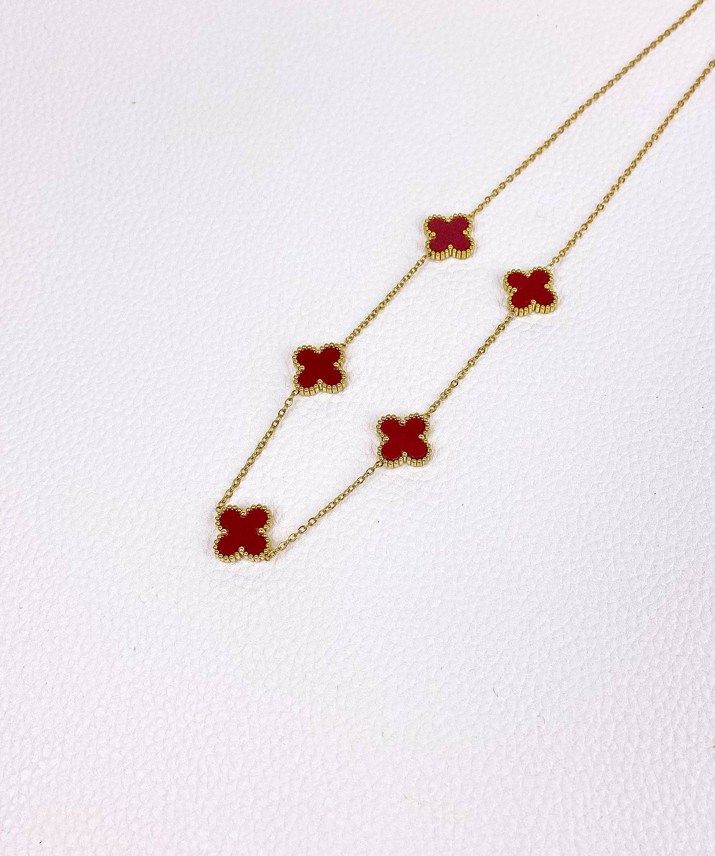Burgundy van cleef gold necklace